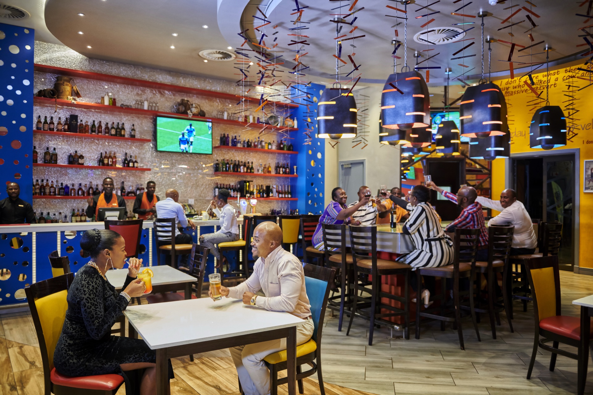 Guests relaxing in the MooBar lounge at Khoroni